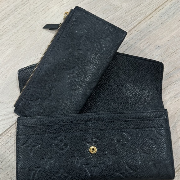 Authentic the Monogram Empreinte Leather wallet - like new - Picture 3 of 7